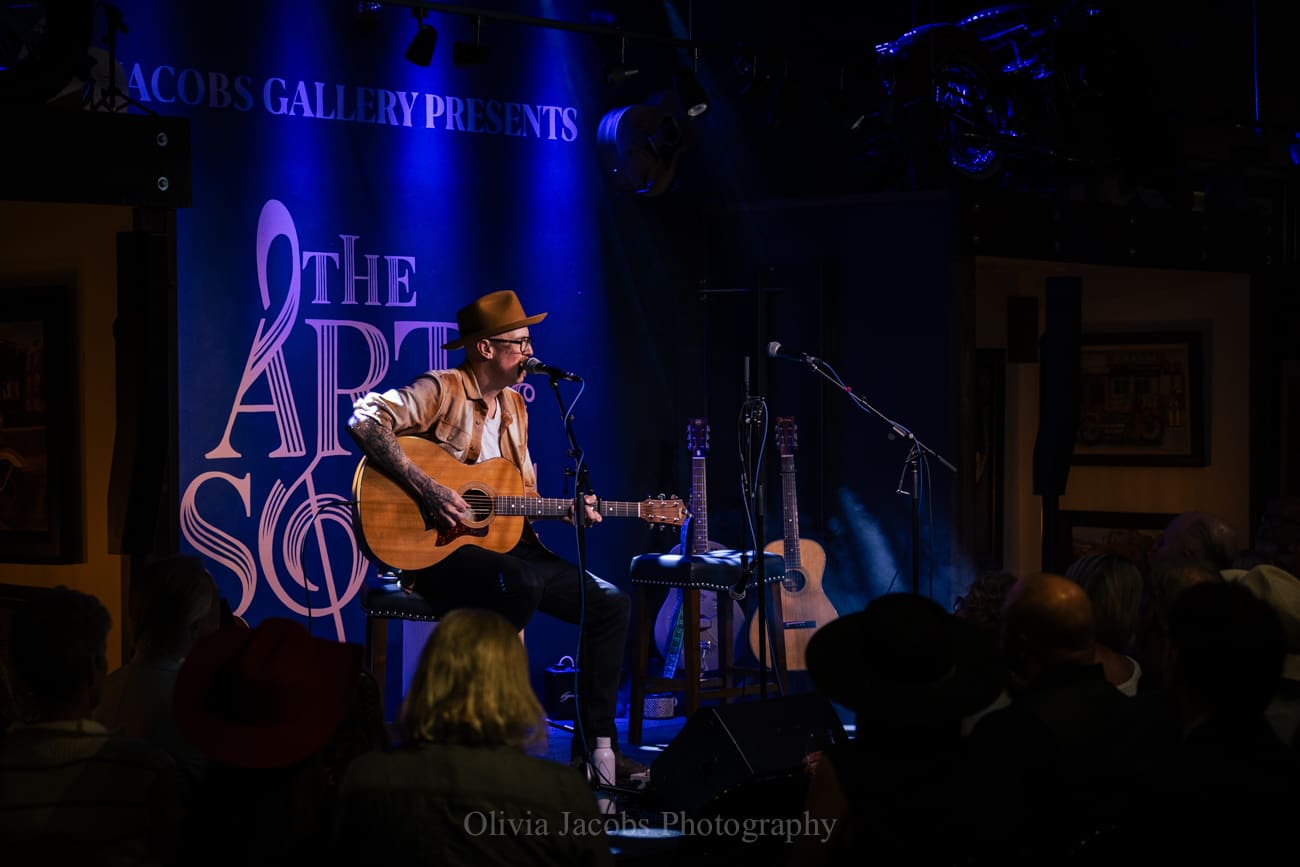 Andrew aj beard playing at the art of song in jacobs gallery deadwood